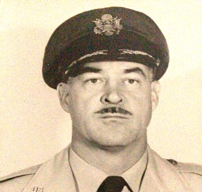 Col. John F . "Jack" Barrett