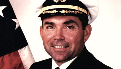 Captain John J. Coonan, Jr., USN